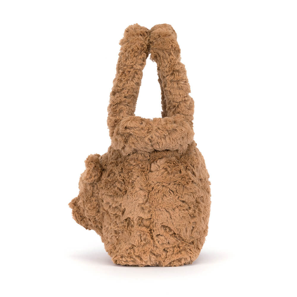 plush teddy bear handbag in a warm camel brown color, featuring a soft, textured fur-like body and matching handle 