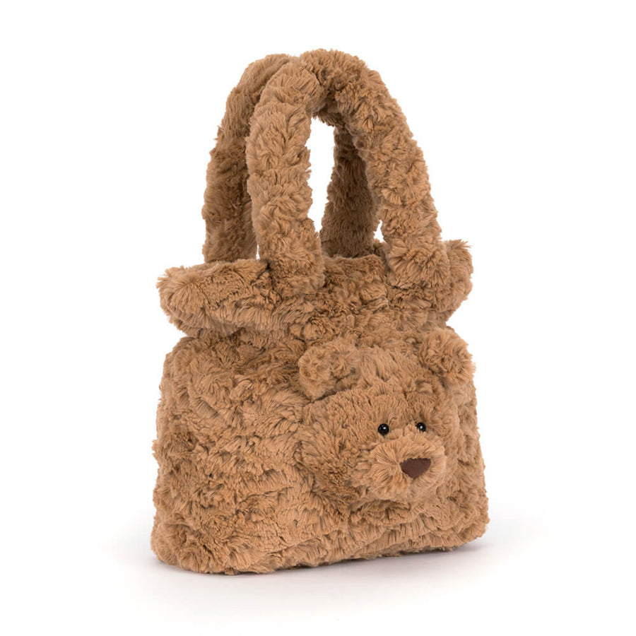  small teddy bear-shaped handbag made of textured, curly brown faux fur, featuring a cute embroidered face and dual top handles 