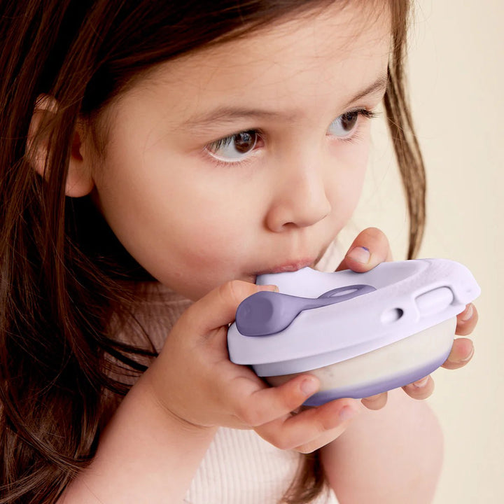 b.box Fill + Feed Storage and Containers Peony - Child using a purple and white device