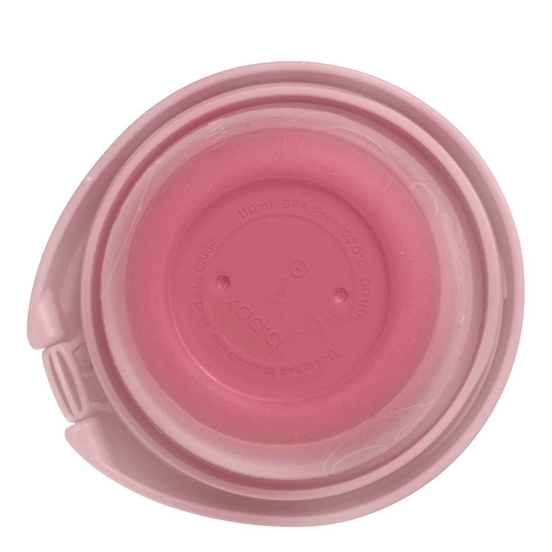 b.box Fill + Feed Storage and Containers Blush - Pink plastic lid with a handle on a white background
