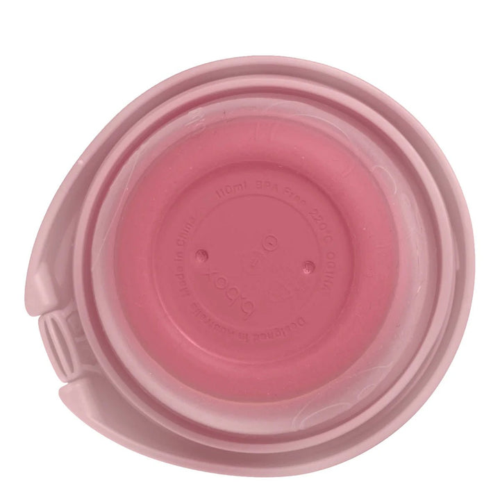 b.box Fill + Feed Storage and Containers Blush - Pink plastic lid with a handle on a white background