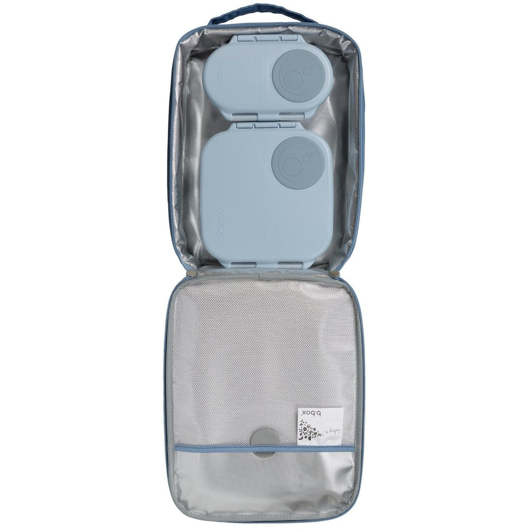 b.box Insulated Flexi Lunchbag Surfs Up -  Clear travel bag with blue interior compartments on a white background