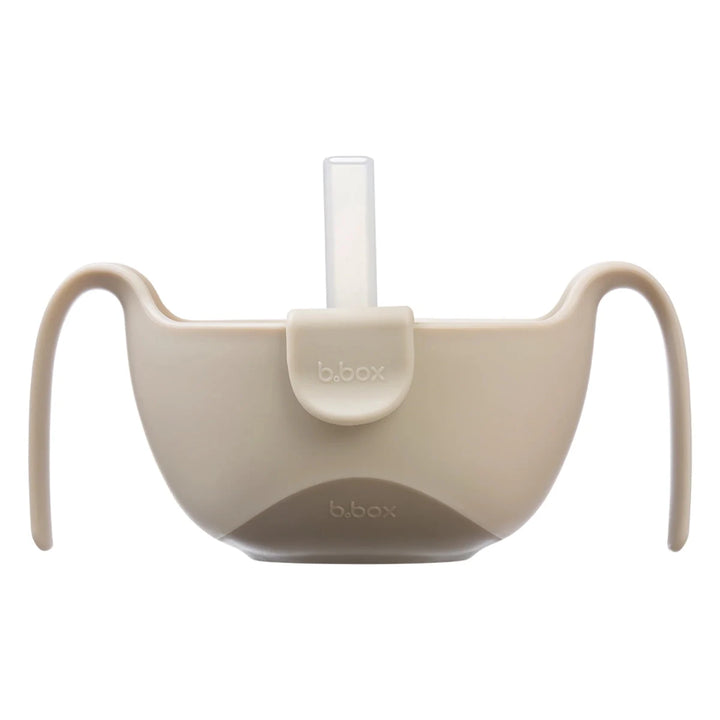 b.box Sip + Snack Bowl Plates, Bowls & Cutlery Latte -  Beige silicone cup holder with a straw on a white background
