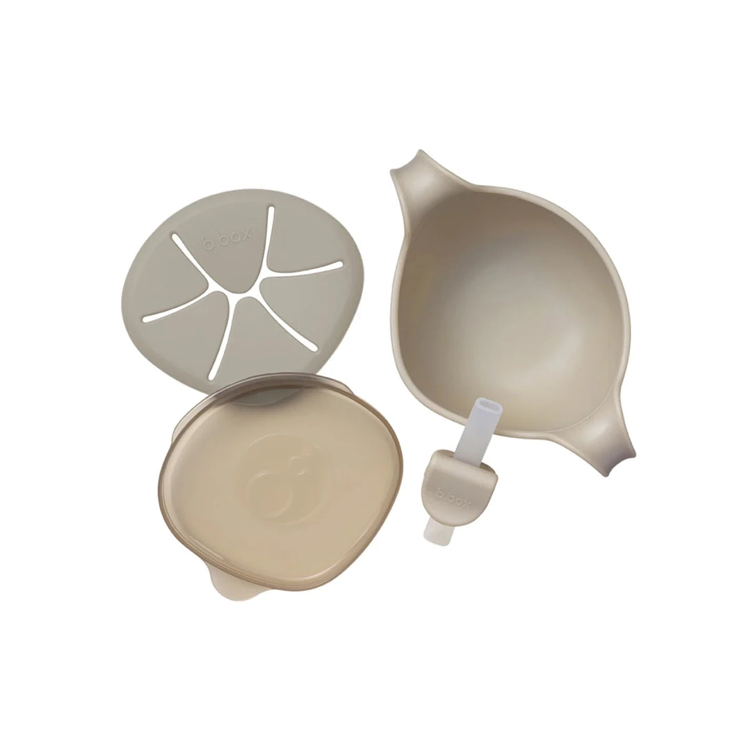 b.box Sip + Snack Bowl Plates, Bowls & Cutlery Latte - including a lid, a bowl, and a strainer on a white background