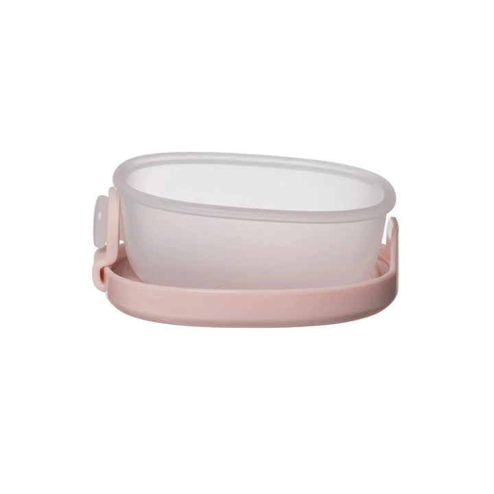 b.box Snack Tubs Berry -  Pink silicone food container with a white lid on a white background
