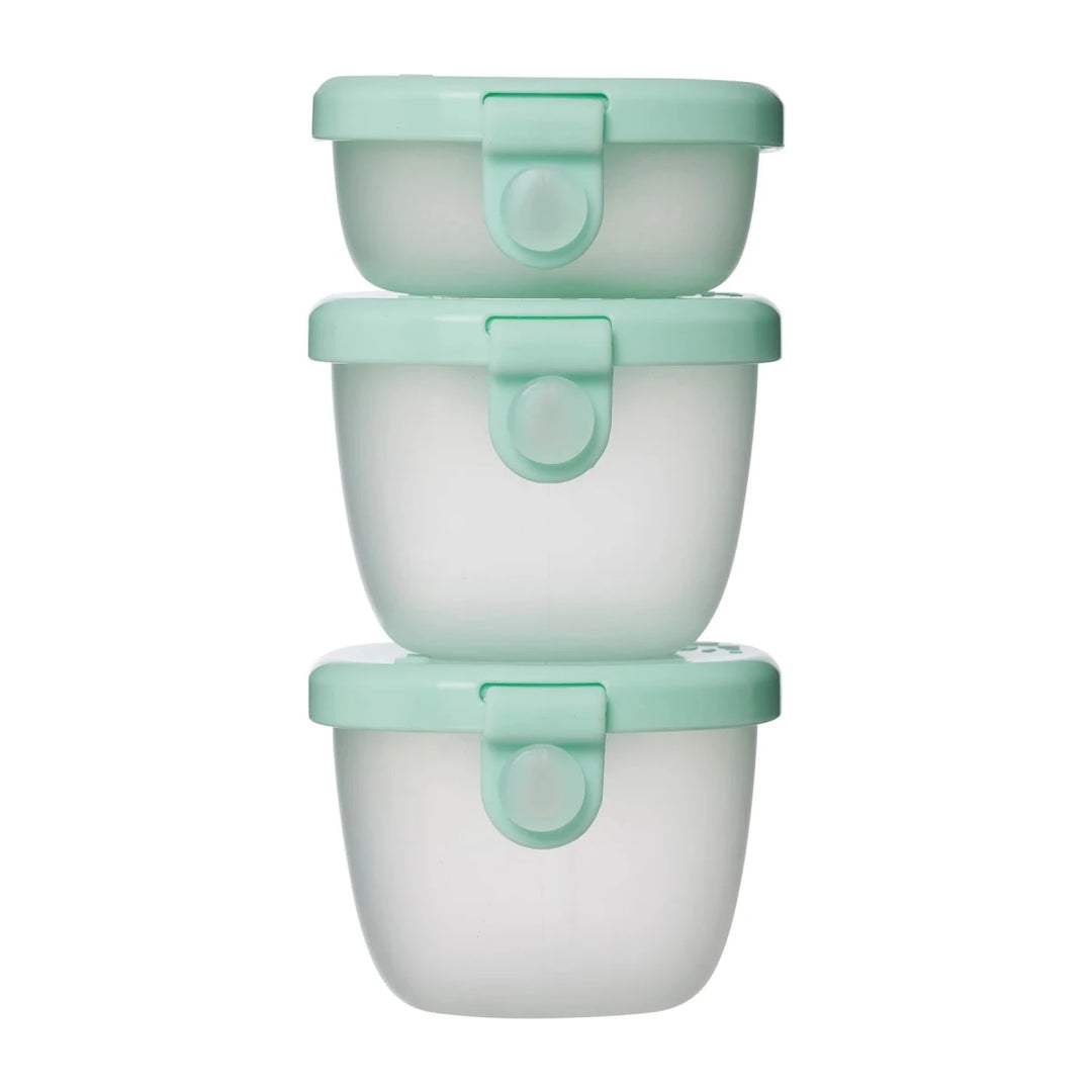 b.box Snack Tubs Forest -  Three stacked food containers with light green lids on a white background