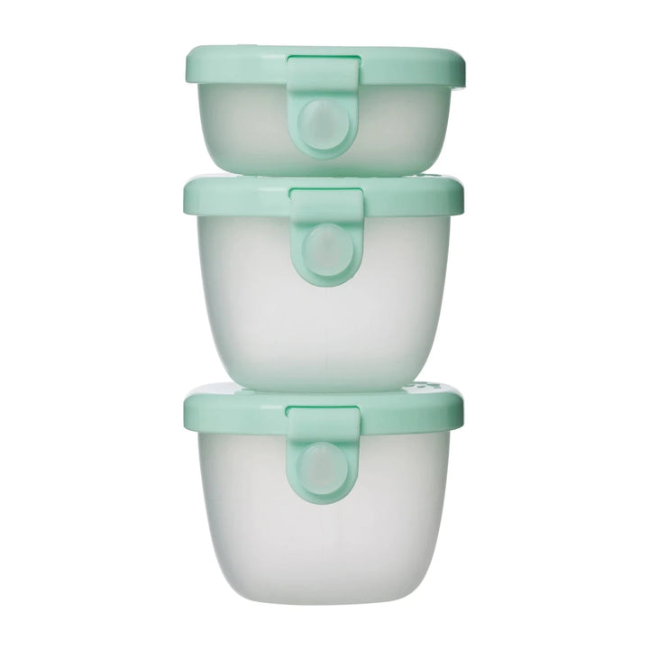 b.box Snack Tubs Forest -  Three stacked food containers with light green lids on a white background