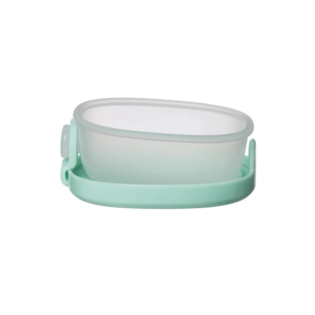 b.box Snack Tubs Forest - Mint green and white silicone food container on a white background