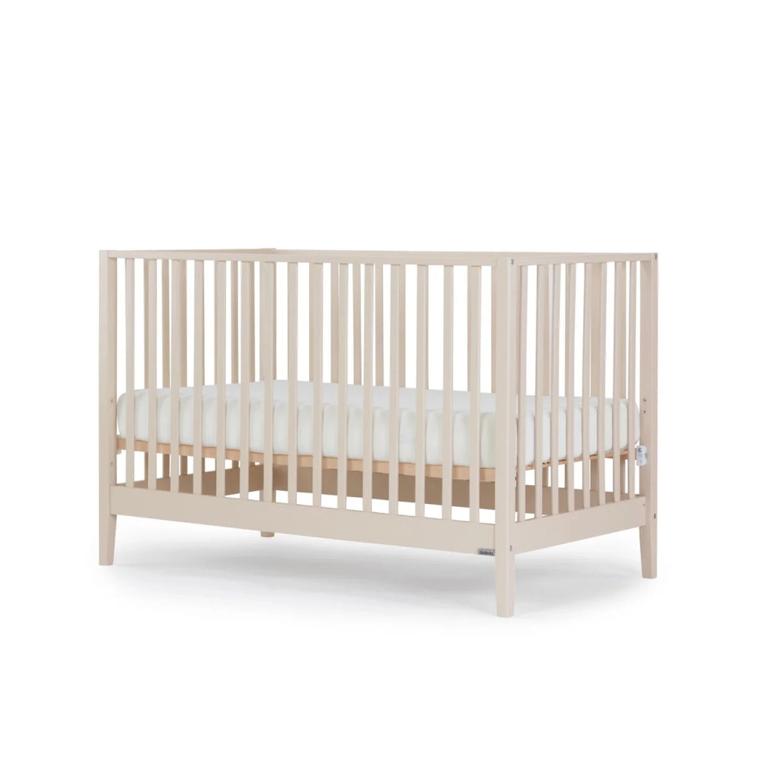 Dadada Furniture Lala 3 in 1 Convertible Crib Cribs & Toddler Beds Almond Milk -  Beige crib with white mattress on a white background