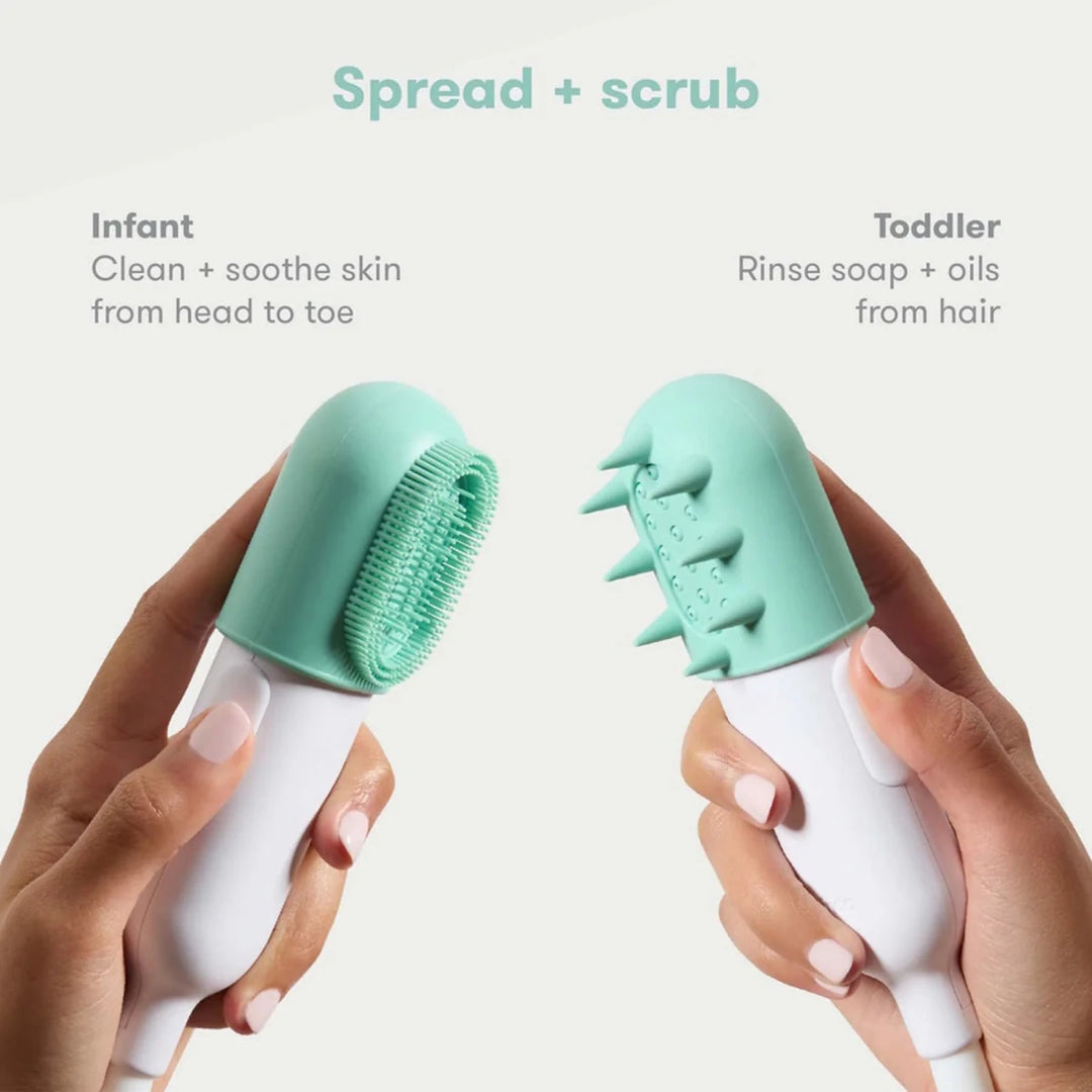 Fridababy - Control the Flow Bath Sprayer - Two handheld cleaning tools with different bristle designs held by hands 