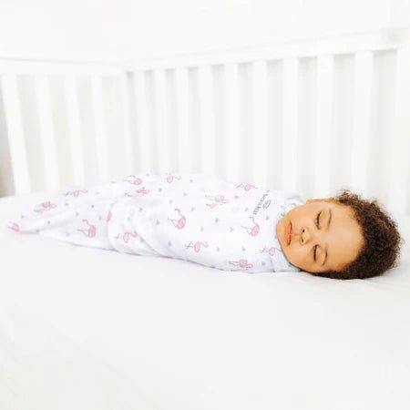 HALO Swaddle 100% Cotton TOG 1.5 SleepSack Swaddle Small flamingo print cotton fabric close-up on white