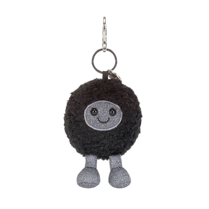 Amuseables Black Hole Bag Charm - Black plush keychain with a smiling face on a white background