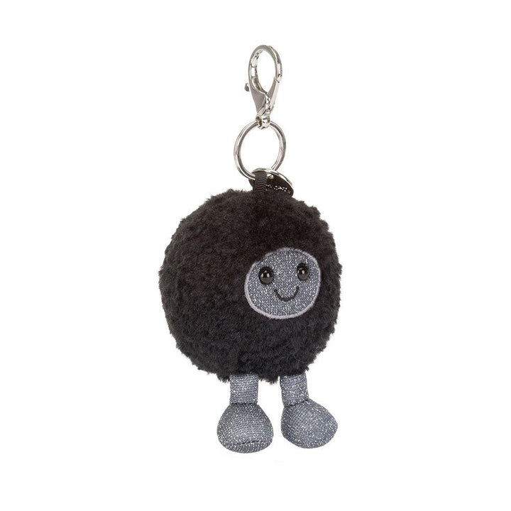 Amuseables Black Hole Bag Charm - Black plush keychain with a smiling face on a white background