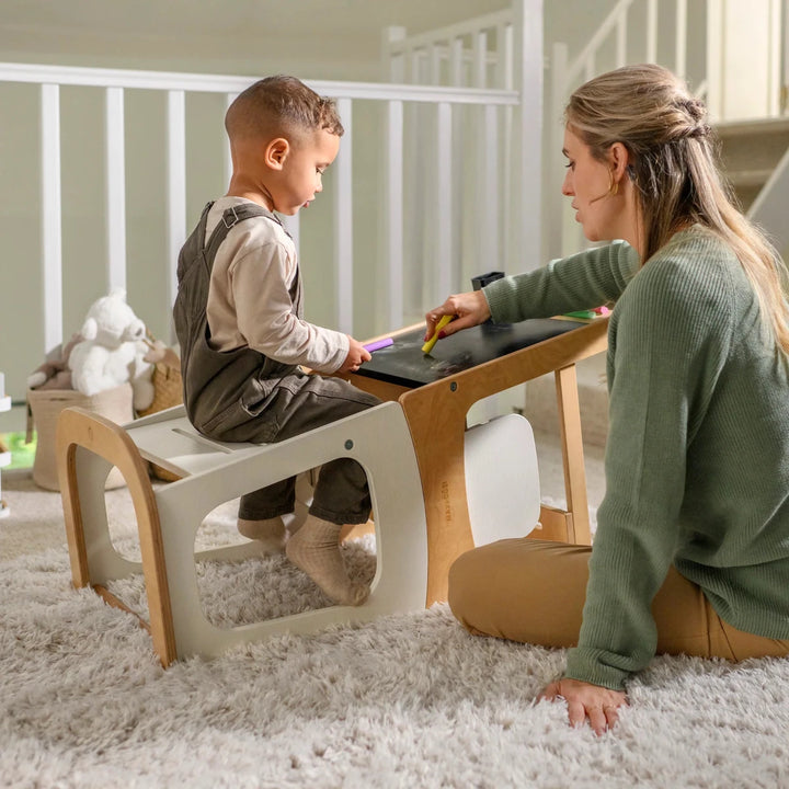 Maxi-Cosi Toucan 3-in-1 Learning Tower front view with Scandinavian wooden design and adjustable toddler platform.