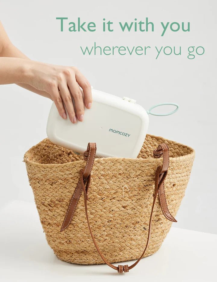 Momcozy travel bottle brush set in compact storage case designed for convenient baby bottle cleaning wherever you go.