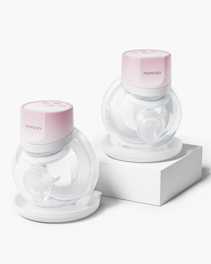 Pair of Momcozy S12 Pro Quick Hands-Free Breast Pumps displayed together on a white background.