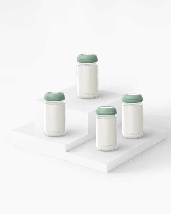 Momcozy Natural Baby Bottle 4-piece set with green lids compatible with Momcozy Cooler on white background