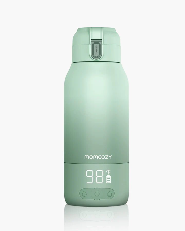 Momcozy Superfast Portable Breast Milk & Water Warmer in mint green with LED temperature display on a white background.
