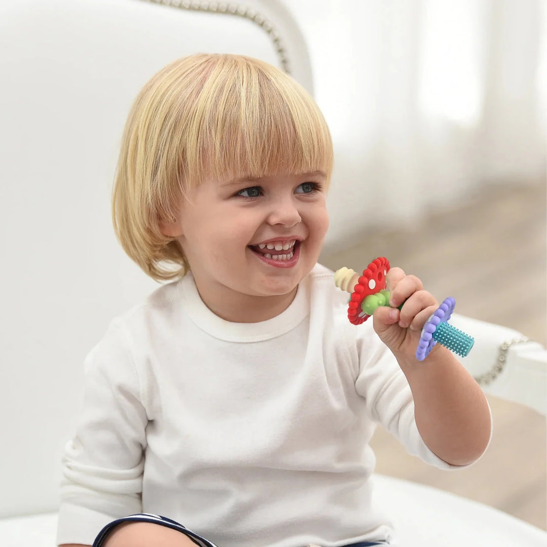 Razbaby Chompy Mushroom Wand Teether side view with textured silicone mushroom head and easy-grip handle for babies