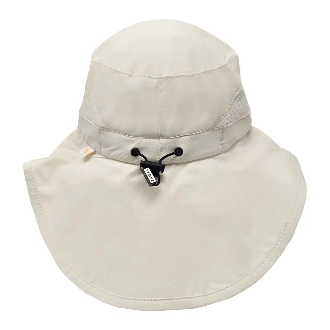 Stonz Explorer Hat 2026 Buttercream -  Beige wide-brimmed hat with a chin strap on a white background
