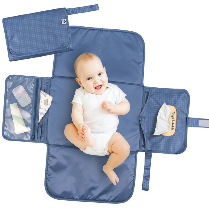 Blue Tiny Twinkle portable diaper changing pad with foldable travel friendly design