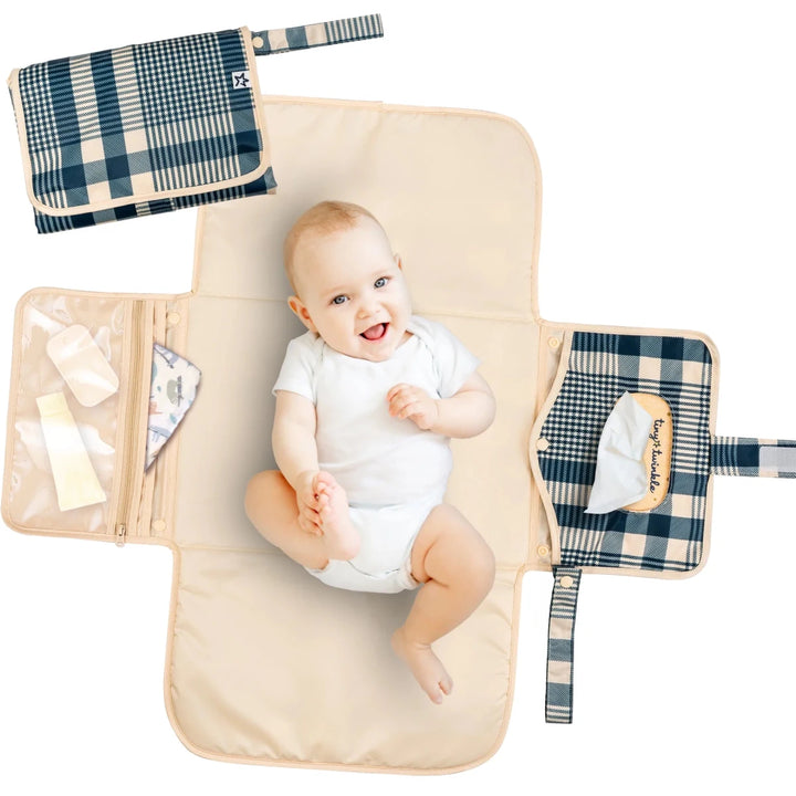 Tiny Twinkle portable diaper changing pad featuring a gingham pattern for babies