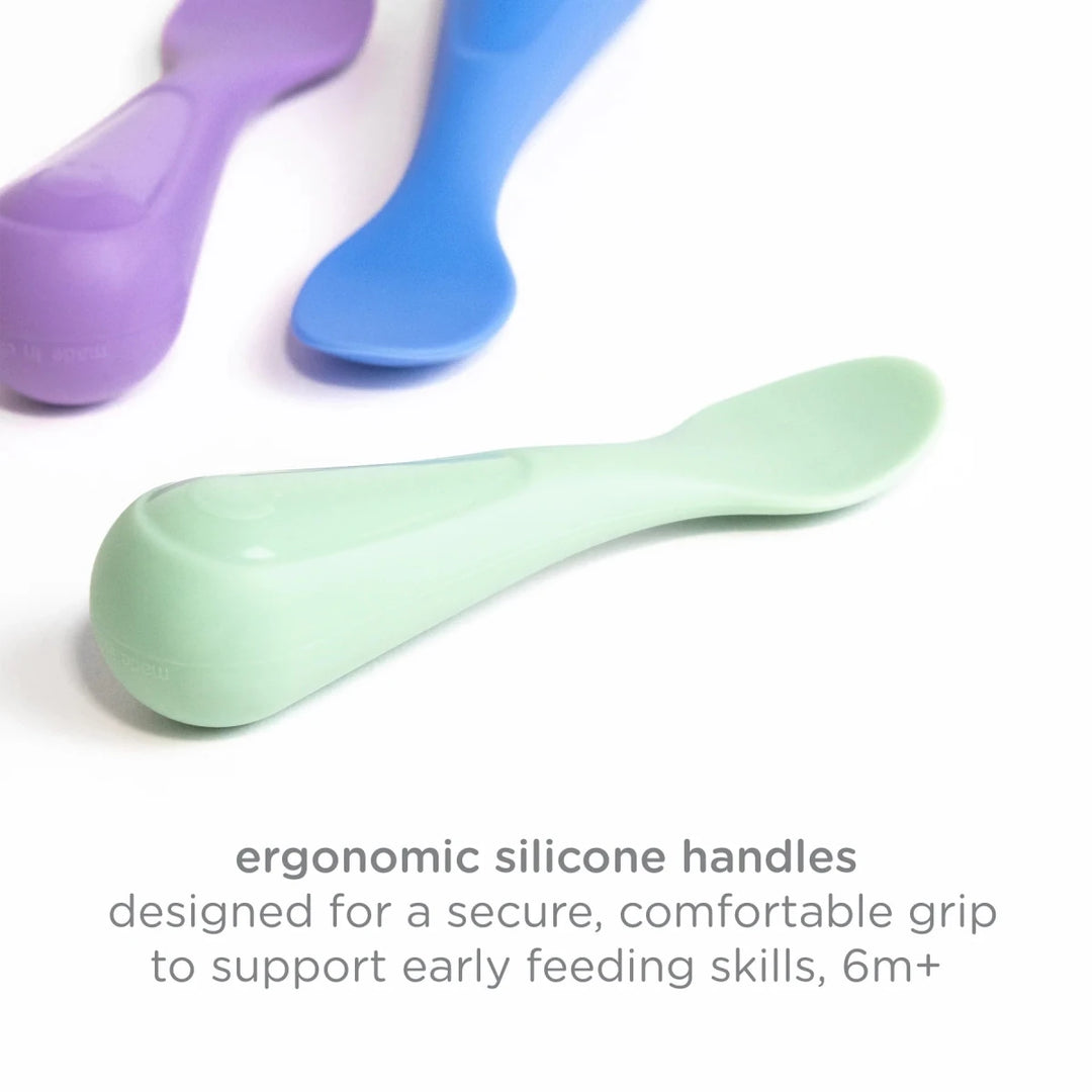 Ubbi Toddler Feeding Set Sugar Snap -  Three silicone spoons in purple, blue, and green on a white background  